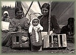 Women, child and their pets, Flying Post.